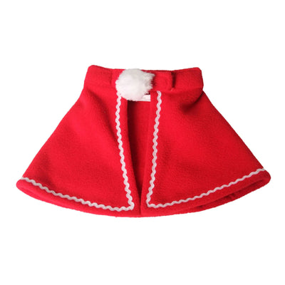 Red Christmas cape for small dogs and cats made of soft fleece with white trim and pom-pom decoration
