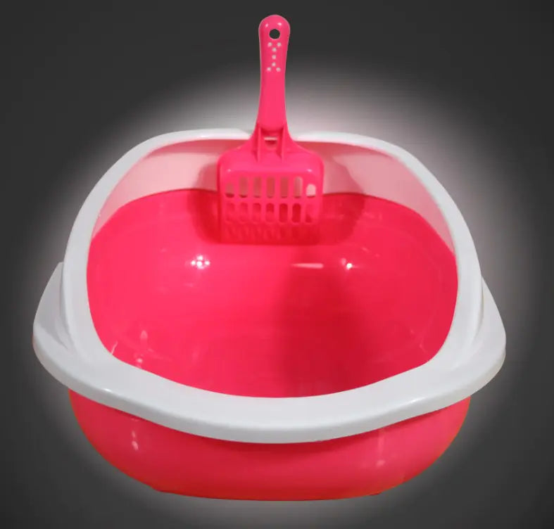 Pink plastic cat litter box with white rim and matching scoop, odor control feature