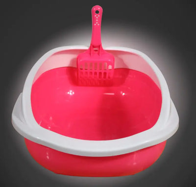 Pink plastic cat litter box with white rim and matching scoop, odor control feature