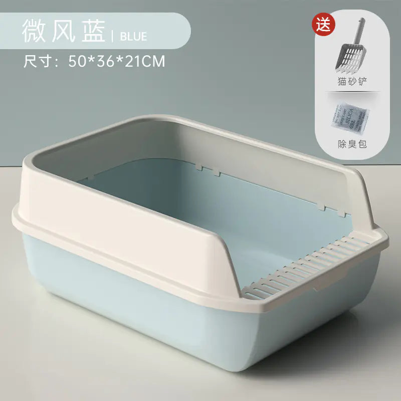 Extra large cat litter box with high splash guard in blue and white design