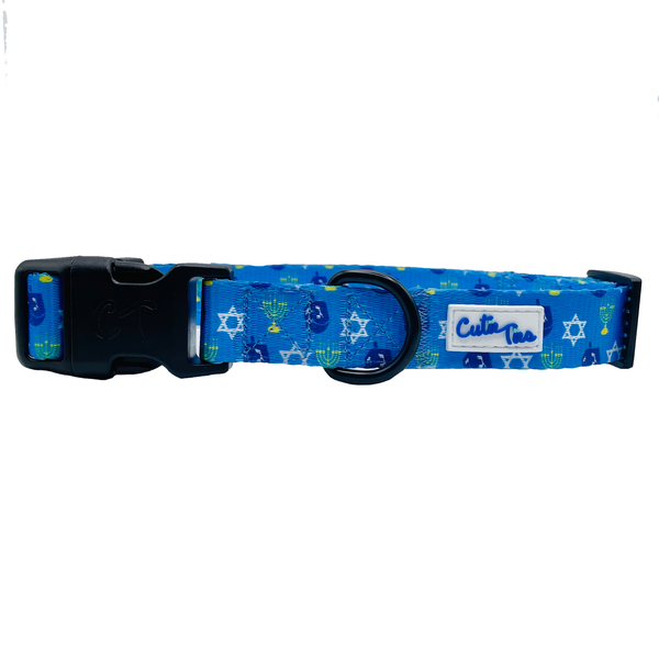 Available in three different sizes and multiple fun exclusive designs, we have collars to fit any dog's personality! Bow tie not included. 
Features

Adjustable siziHanukkah Dreidel Blue Dog CollarLeashes, Collars & PetwearPlum SemeleDean's Pet Outlet Hanukkah Dreidel Blue Dog Collar