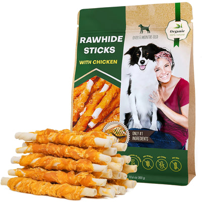 Dog rawhide sticks wrapped with chicken natural grain-free chew treats for healthy teeth and gums
