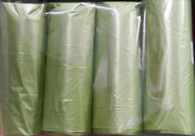 Green eco-friendly garbage bags for Ultimate Cat Litter Scoop waste management