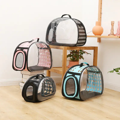 Set of foldable PVC space capsule cat carrier bags in black, blue, pink, and grey colors designed for pet travel and comfort