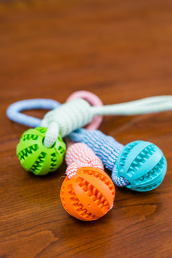  Descriptions:

A high-quality bite-resistant cotton rope that is safe and tasteless. The material is soft and doesn't hurt your dog's teeth. 
Usage: The dog's chew Durable Rubber Ball Chew Toy with Cotton RopeToysTeal ZeusDean's Pet Outlet Durable Rubber Ball Chew Toy