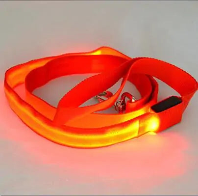 Glow in dark dog leash glowing orange for nighttime safety and visibility