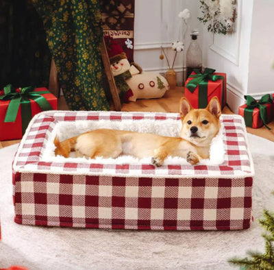 Classic Plaid Pet Bed with red plaid pattern and soft cozy interior featuring a dog lying comfortably inside