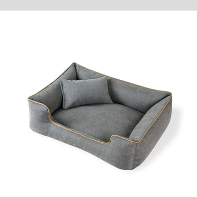 Warm gray removable washable bed for small dogs with pillow and piping detail